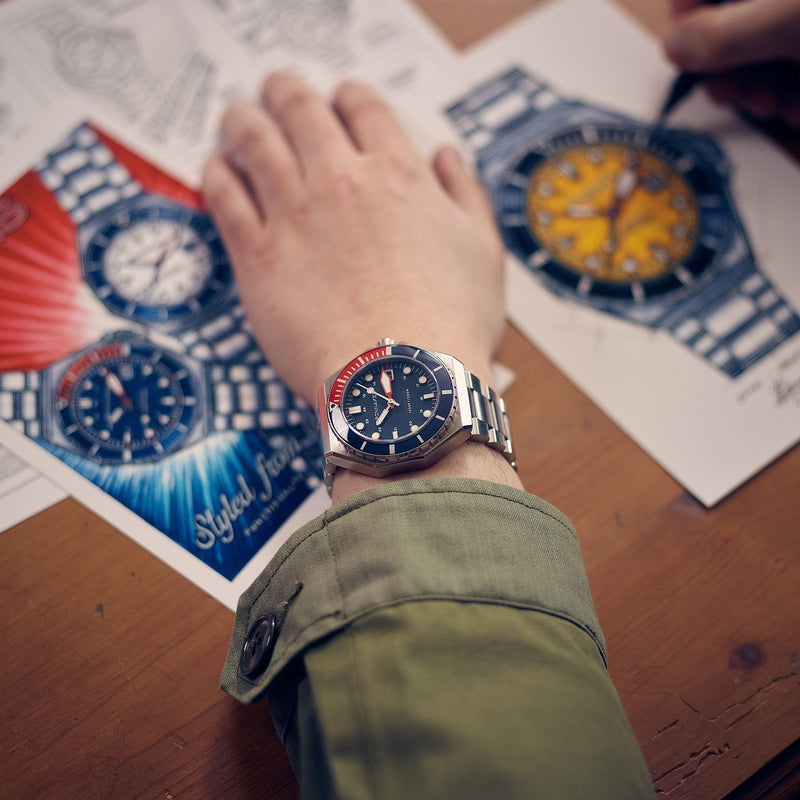 Dumas Blue Dial / Red / Stainless Steel | Blue Dial