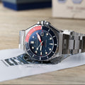 Dumas Blue Dial / Red / Stainless Steel | Blue Dial